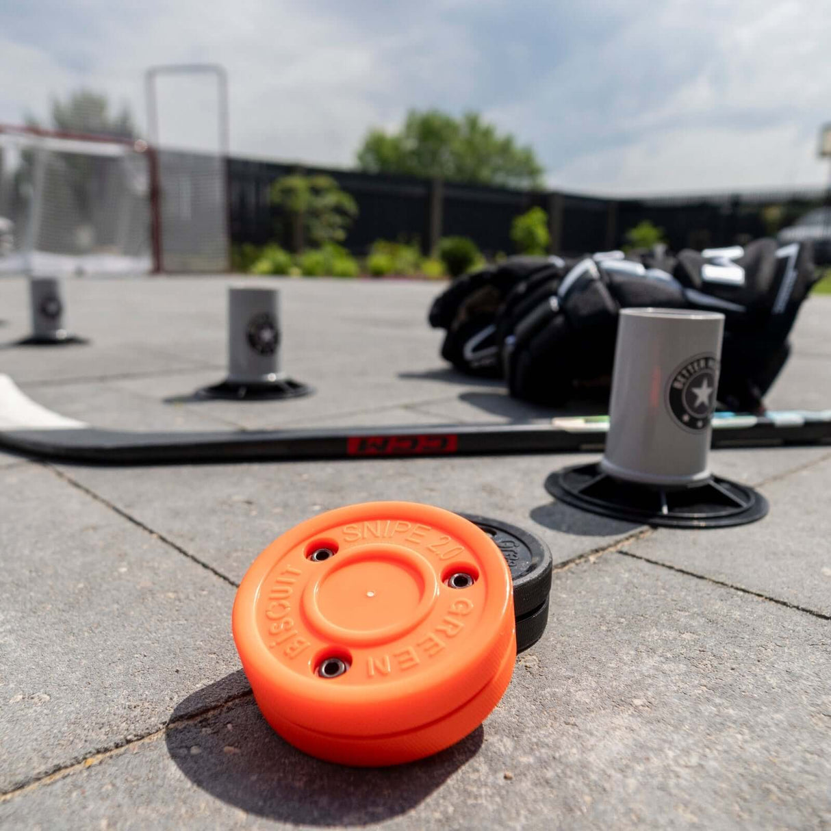 Extreme Hockey Drill Cones and training equipment on an outdoor surface, ideal for skill improvement.